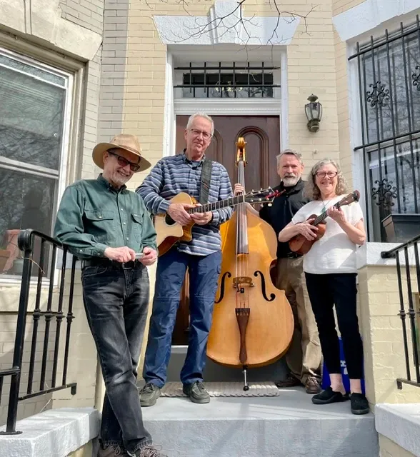 A string band playing on a Capitol Hill front porch